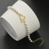 Armband van stainless steel met 14 krt goudplating BST1531