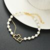 Armband van stainless steel met 14 krt goudplating BST1531