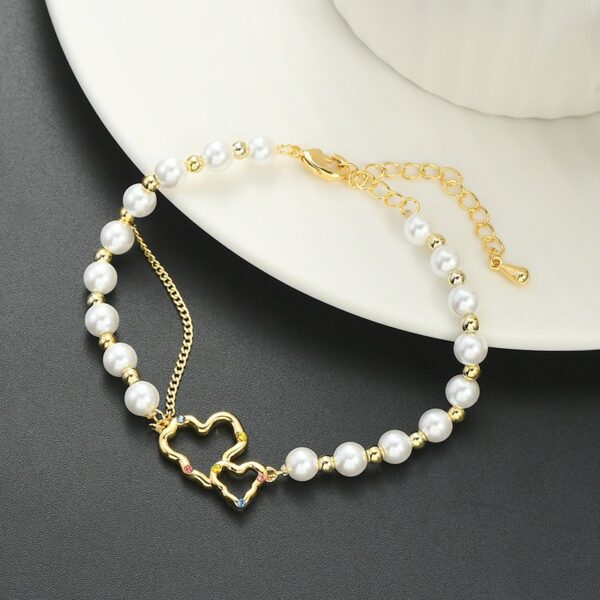 Armband van stainless steel met 14 krt goudplating BST1531