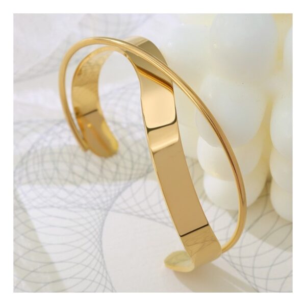 Armband van stainless steel met 14 krt goudplating BST1543