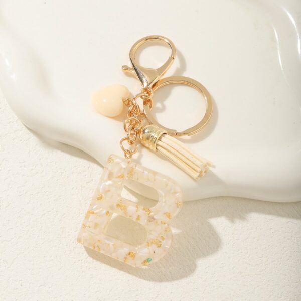 Sleutelhanger letter B met witgouden steentjes en hart BRL329B