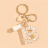 Sleutelhanger letter B met witgouden steentjes en hart BRL329B
