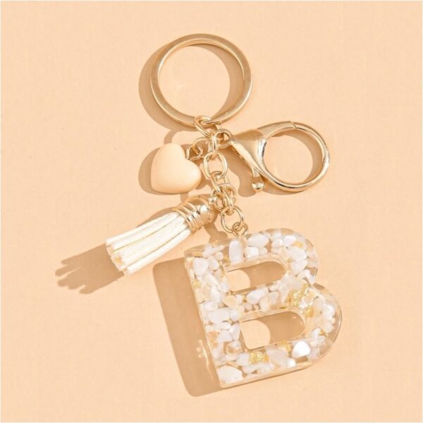 Sleutelhanger letter B met witgouden steentjes en hart BRL329B