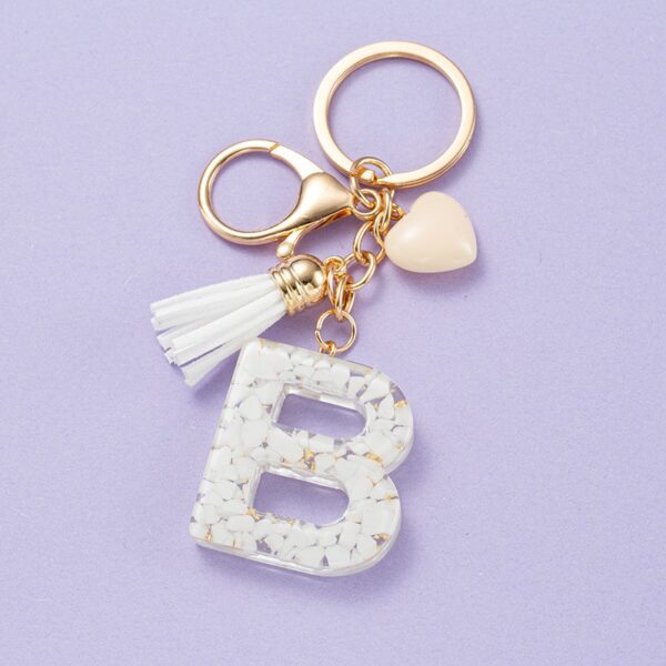 Sleutelhanger letter B met witgouden steentjes en hart BRL329B