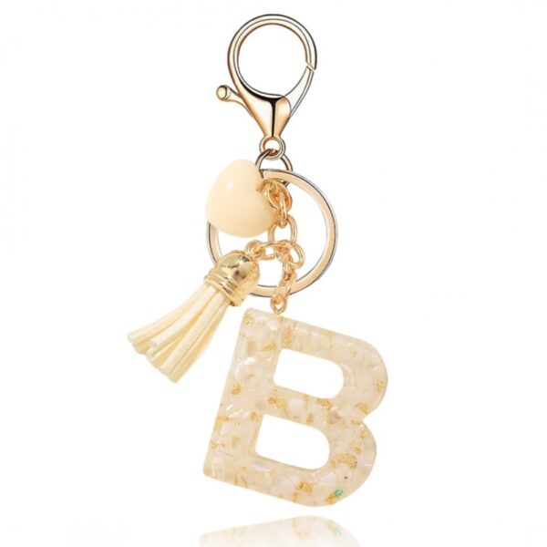 Sleutelhanger letter B met witgouden steentjes en hart BRL329B