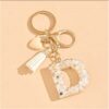 Sleutelhanger letter D met steentjes en hartje BRL329D