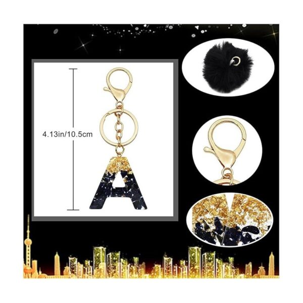 Sleutelhanger LETTER J met pompon zwart en goud BRL342J
