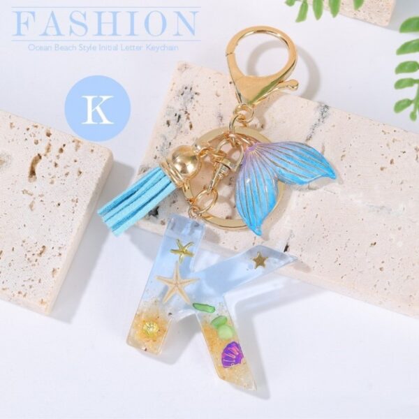 Sleutelhanger letter K zeemeerminstaart schelpen franjes BRL353K