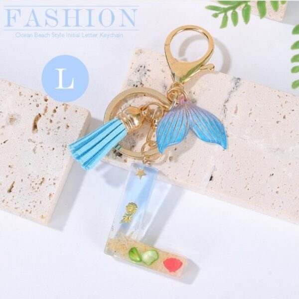 Sleutelhanger letter L zeemeerminstaart schelpen franjes BRL353L