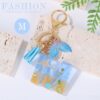 Sleutelhanger letter M zeemeerminstaart schelpen franjes BRL353M