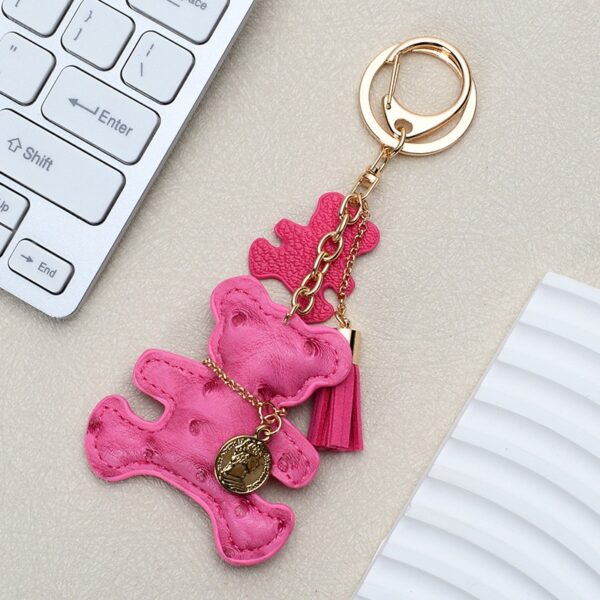 Sleutelhanger beertje en franjes fuchsia BRL357