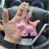 Sleutelhanger hond en franjes roze BRL355