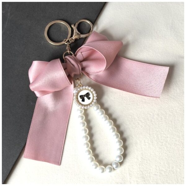 Sleutelhanger met strik en parels roze BRL362R